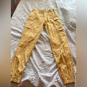 Cargo Pants with adjustable zippers at the bottom **Can also fit tall girls”